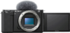 Sony ZV-E10 - voorkant zonder lens met deadcat op mic en flip out scherm